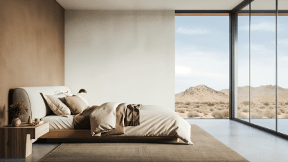 Minimalist bedroom with large windows and desert views